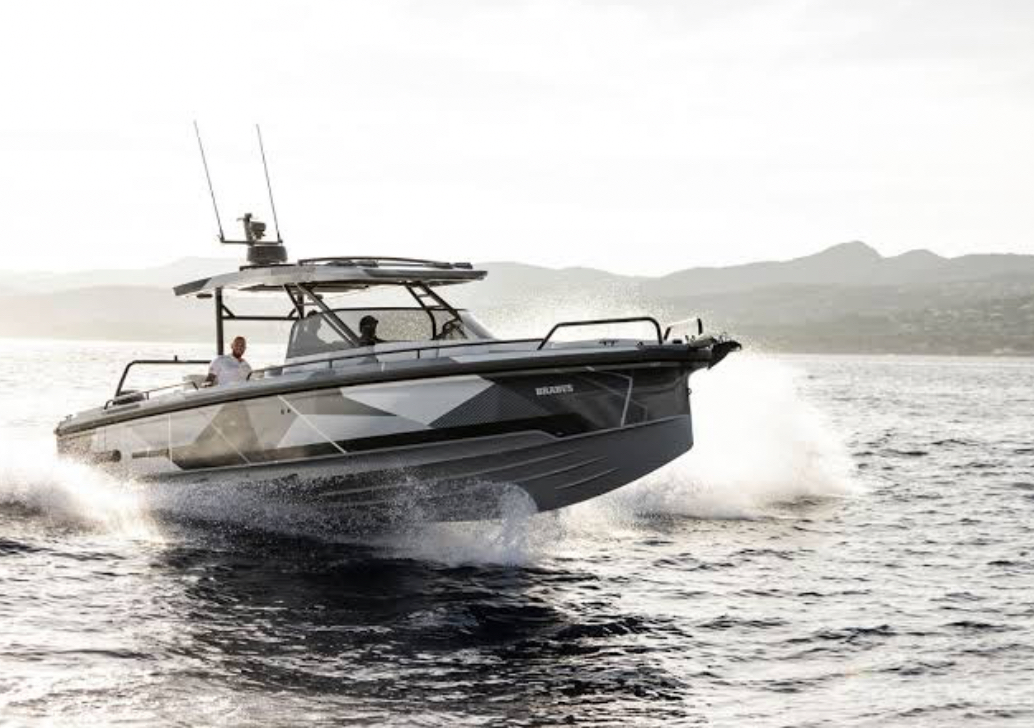 Modern boat speeding through water