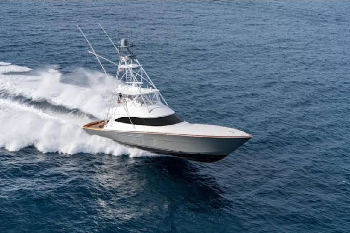 Sport fishing boat cutting through waves